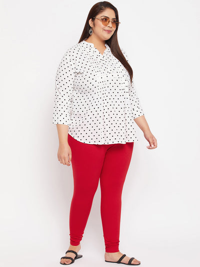 Red solid ankle length leggings with elastic waistband.