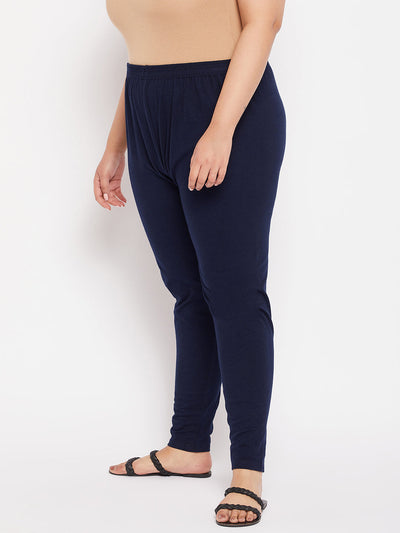 Navy blue solid ankle length leggings with elasticated waistband.