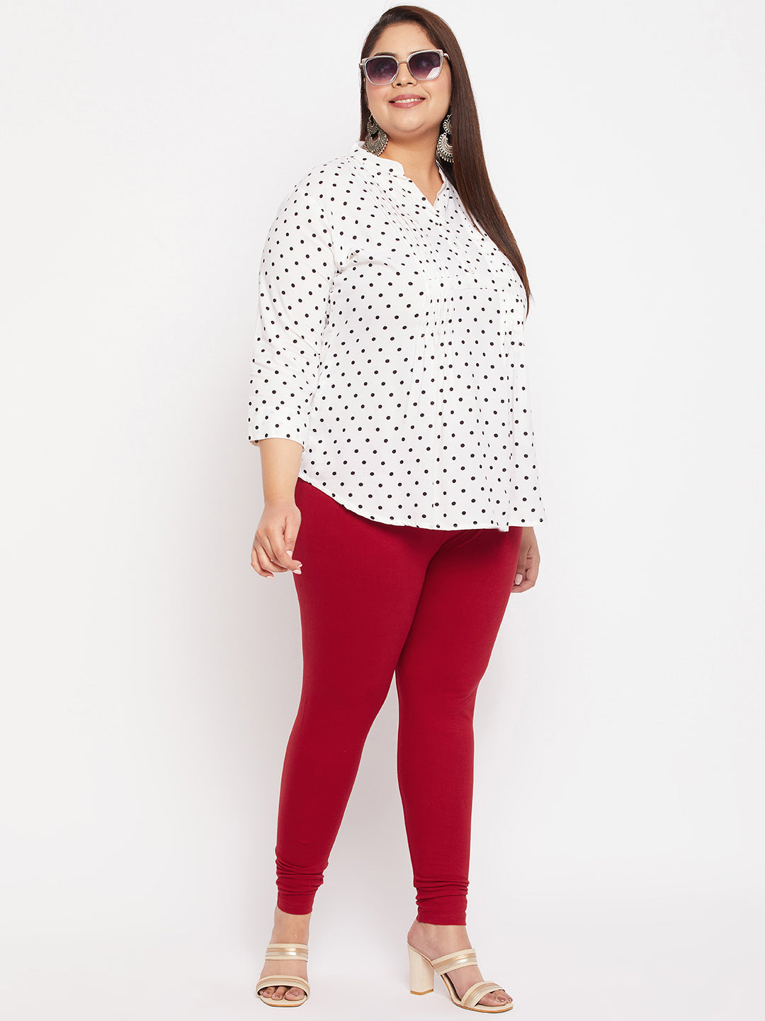 Maroon solid ankle length leggings with elasticated waistband.