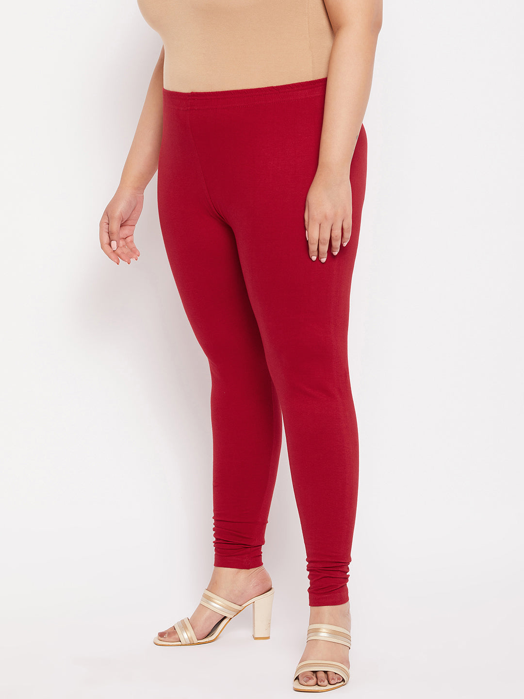 Maroon solid ankle length leggings with elasticated waistband.