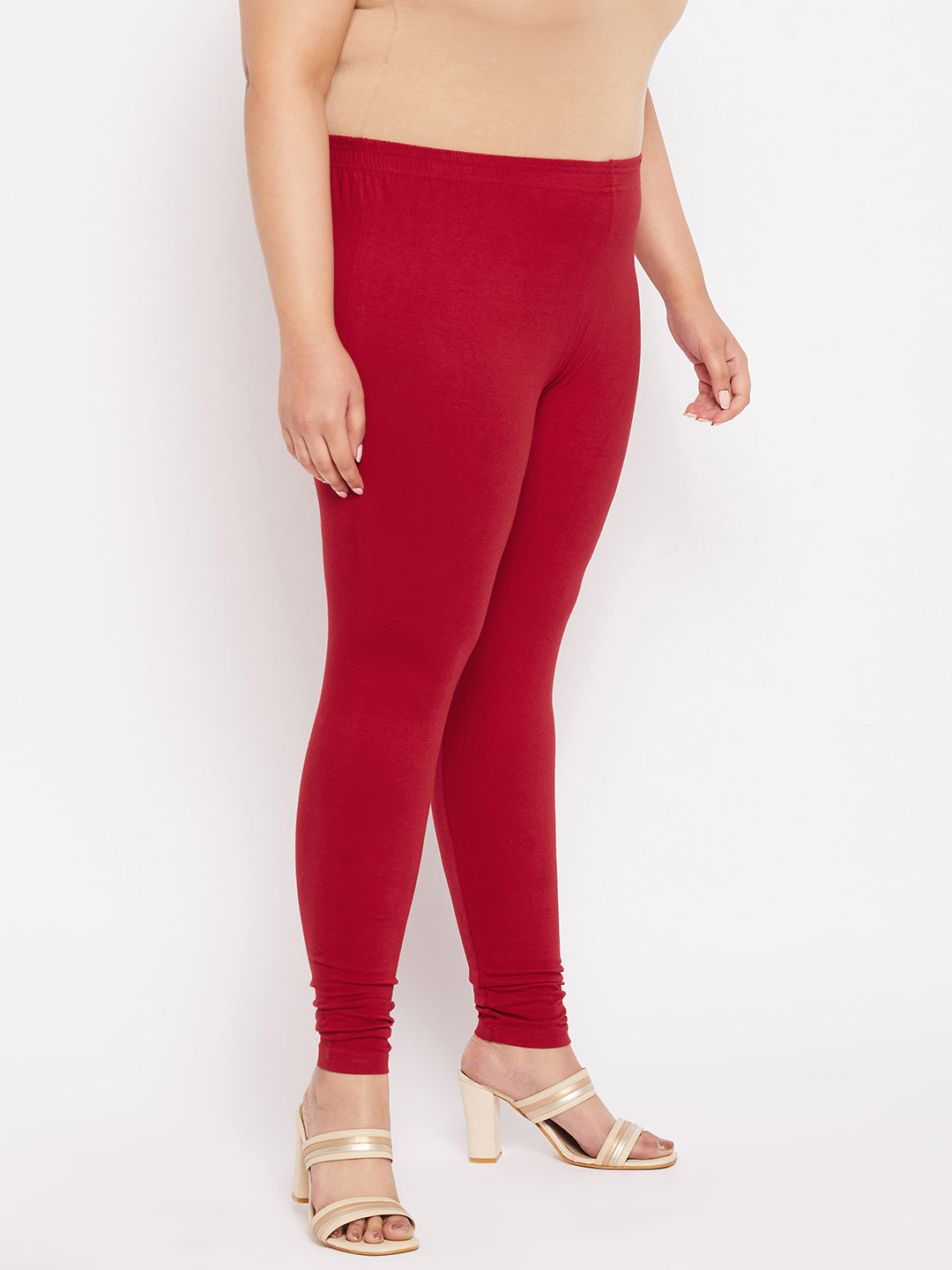 Maroon solid ankle-length leggings with elastic waistband.