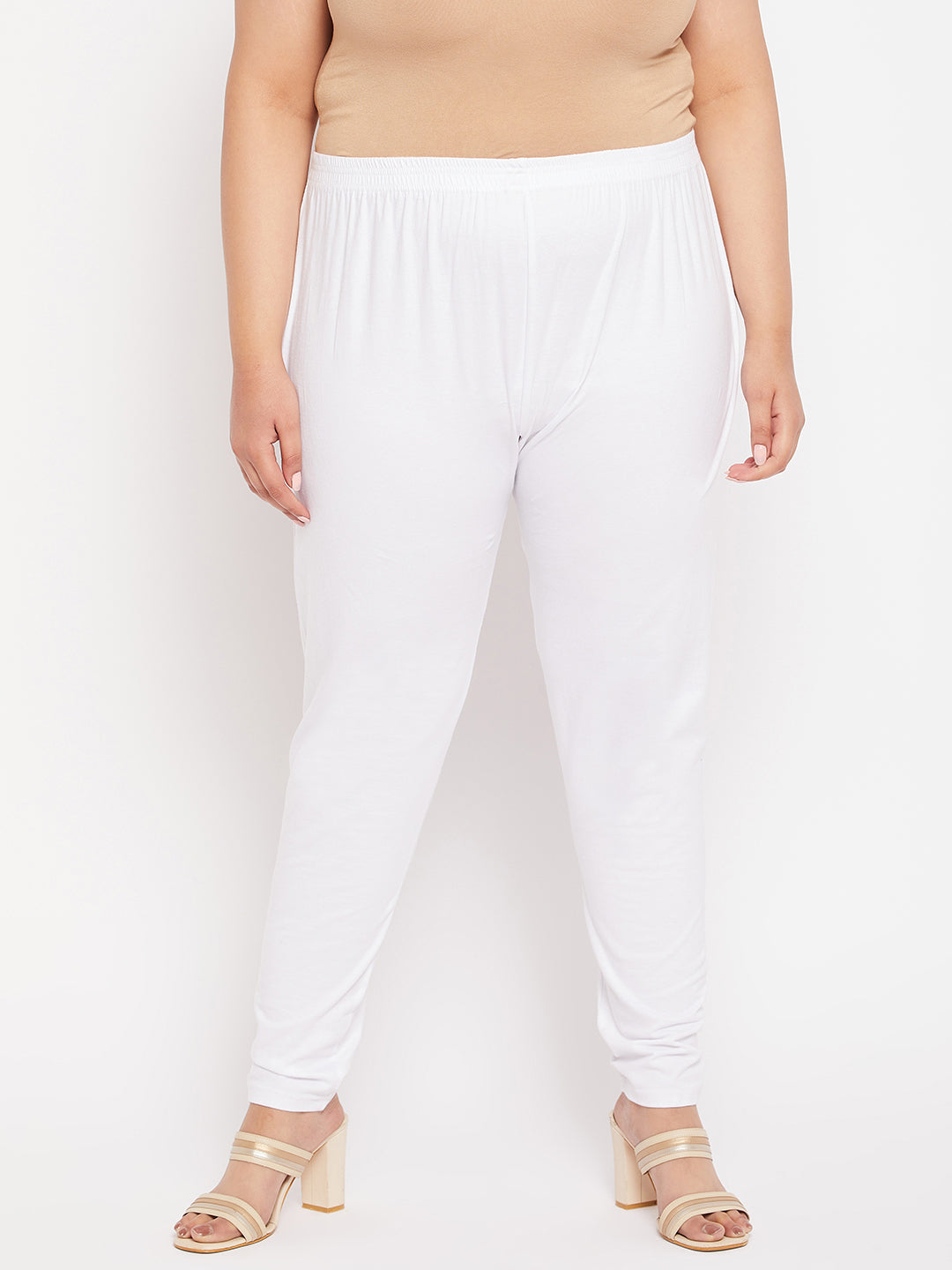 White solid ankle length leggings with elasticated waistband.