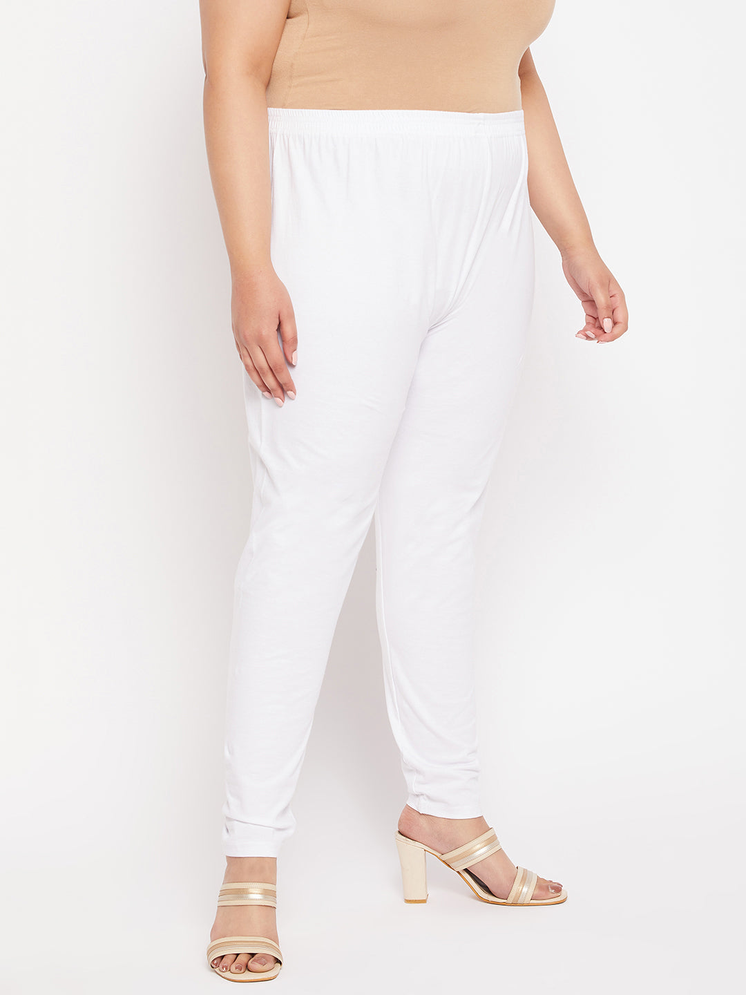 White solid ankle-length leggings with elastic waistband.