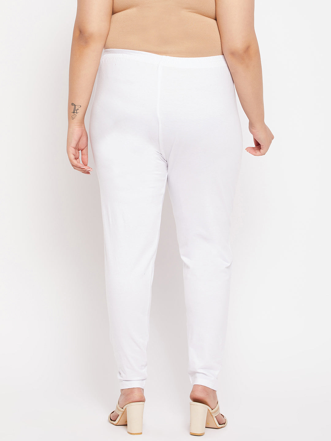 White solid ankle length leggings with elasticated waistband.