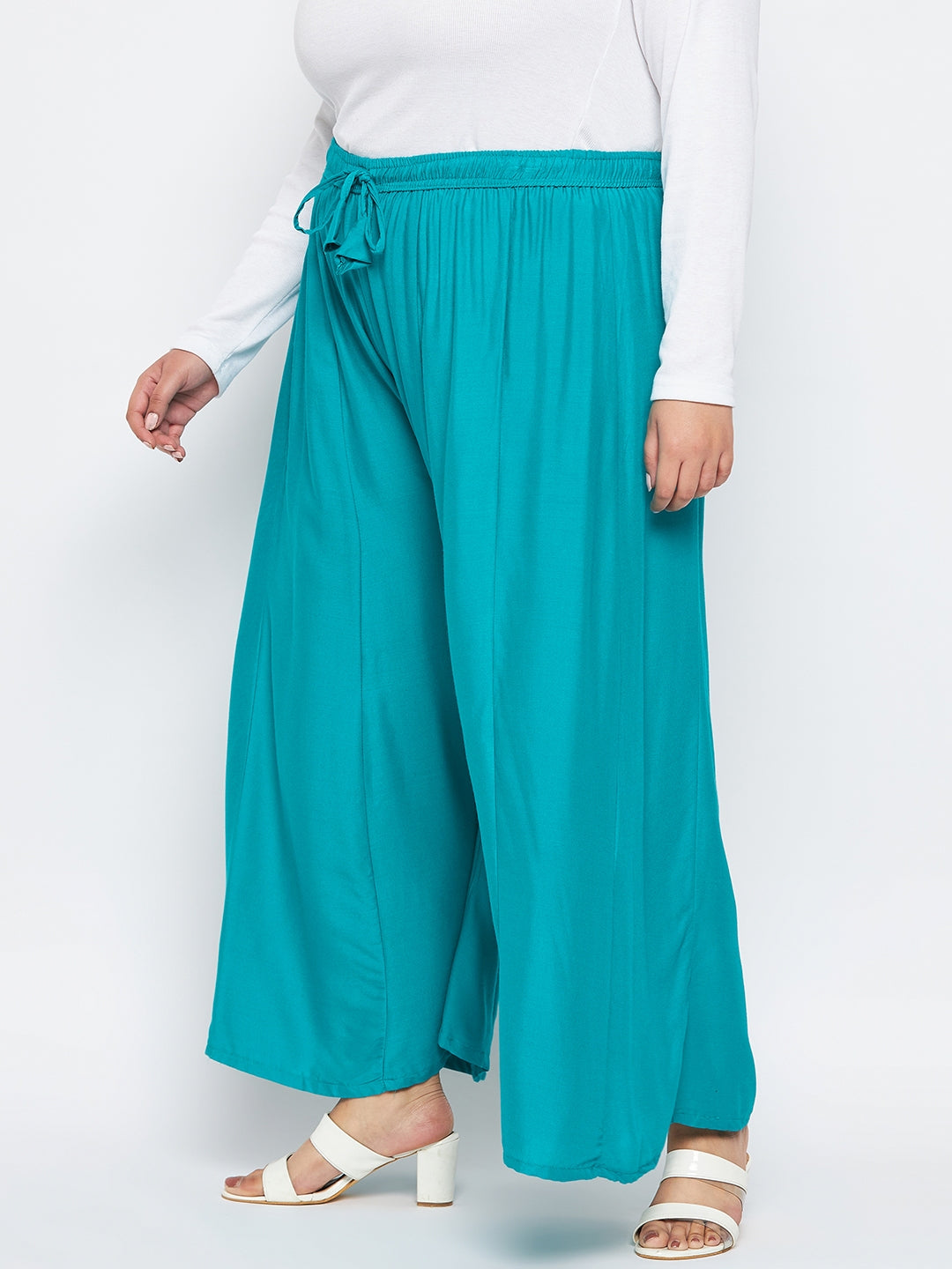 Rama Green Solid Rayon Flared Sharara with elastic waistband and drawstring.