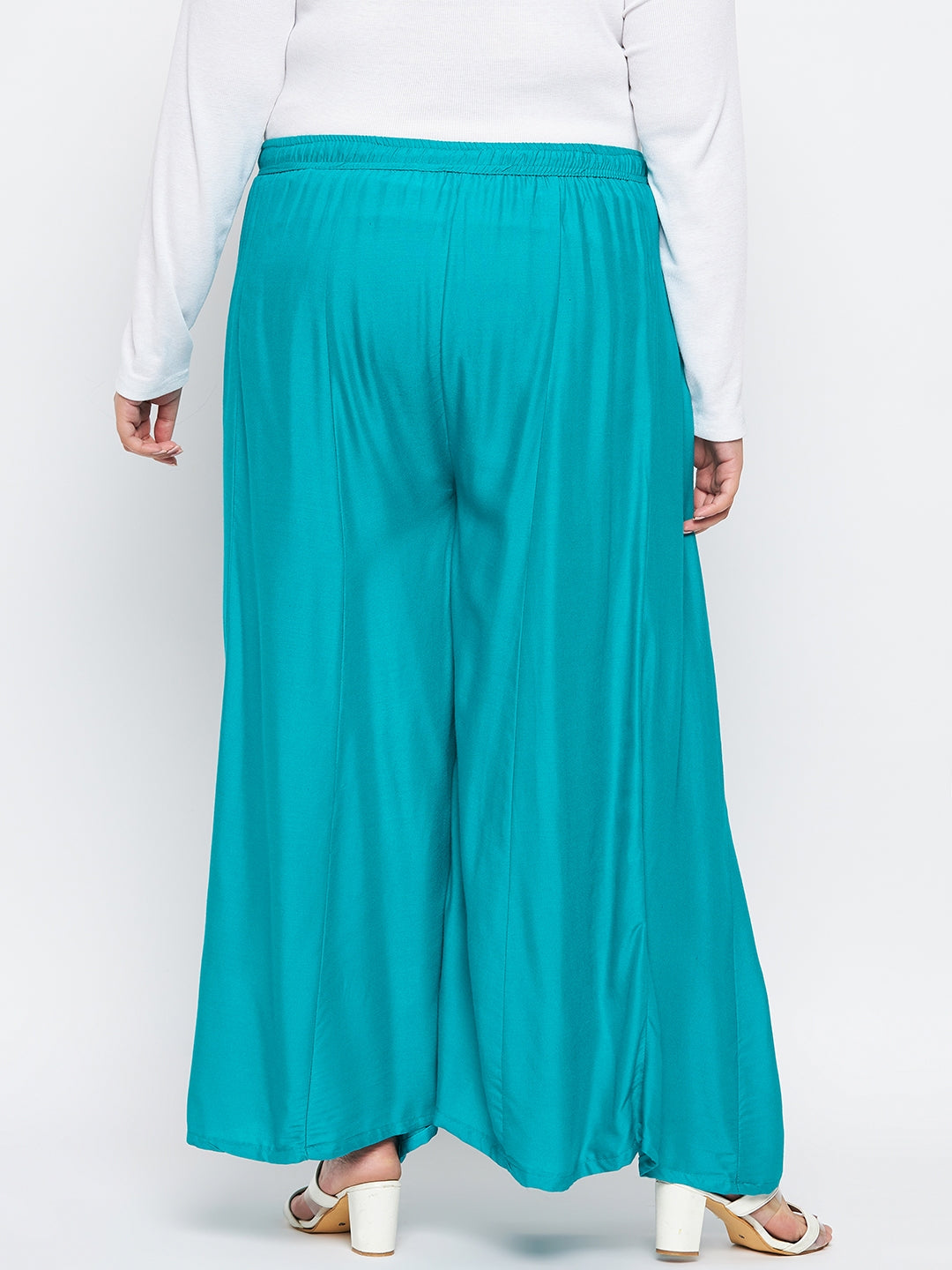 Rama Green Solid Rayon Flared Sharara with elasticated waistband.