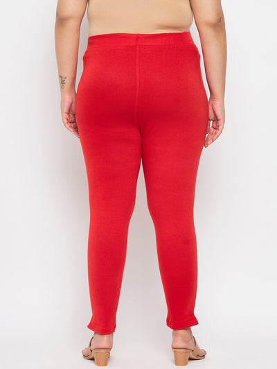 Red solid ankle length leggings with elasticated waistband.