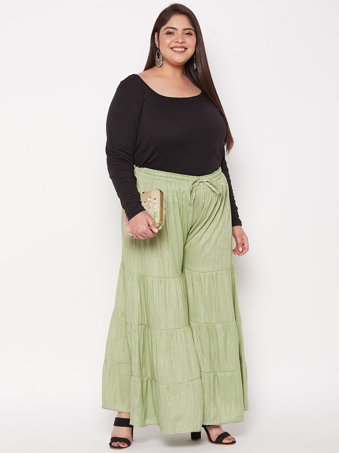 Pista Green Striped Rayon Flared Gharara with elasticated waistband and drawstring.