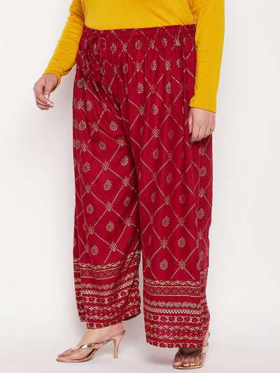 Maroon printed rayon palazzo with elasticated waistband and drawstring.