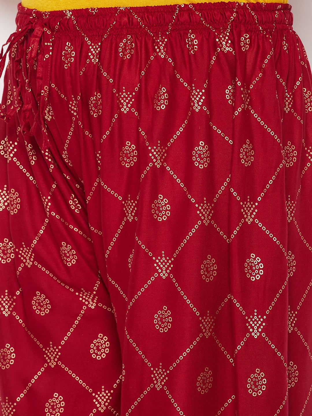 Maroon printed rayon palazzo with an elasticated waistband and drawstring.