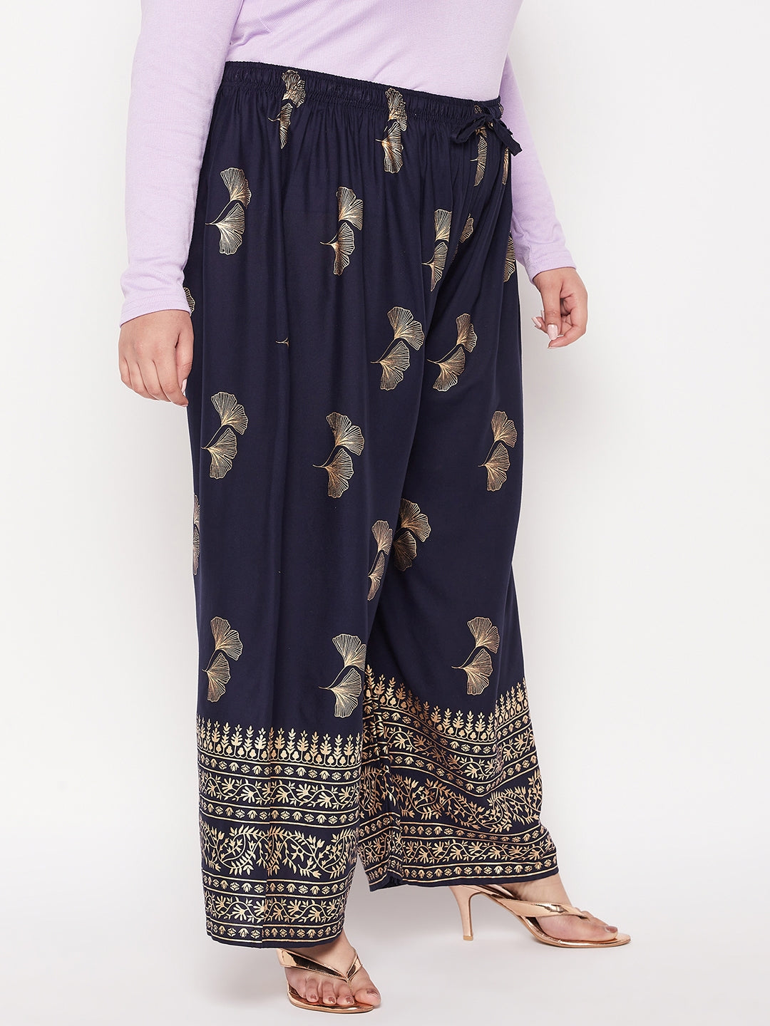 Navy blue printed wide leg rayon palazzo with elasticated waistband and drawstring.