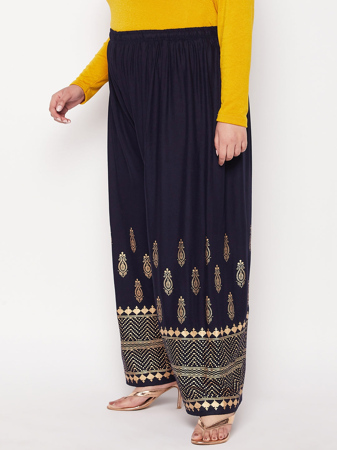 Navy blue gold printed rayon palazzo with elasticated waistband and drawstring.