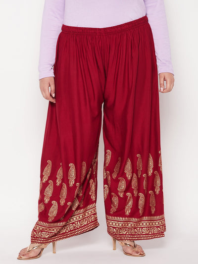 Maroon printed rayon palazzo with elasticated waistband and drawstring.