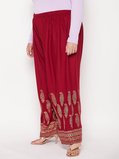 Maroon printed rayon palazzo with wide legs and elasticated waistband.