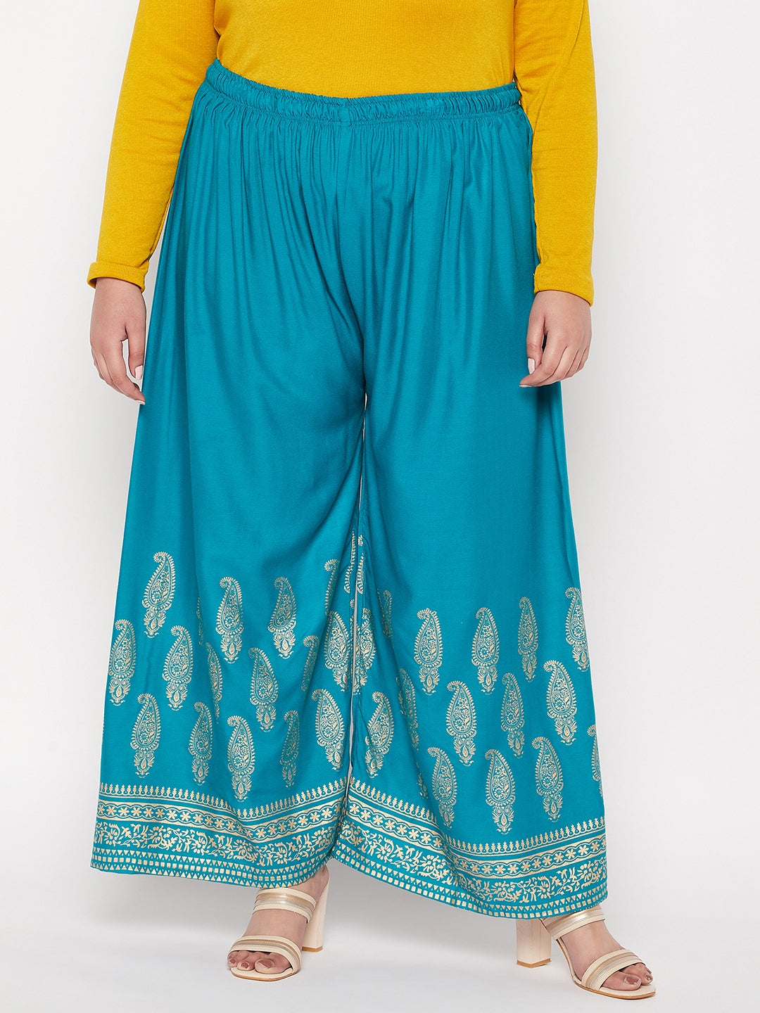 Rama green printed rayon palazzo with elasticated waistband and drawstring.