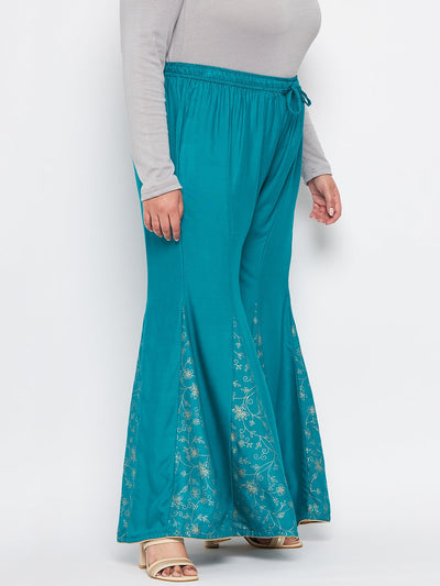 Rama Green Printed Rayon Flared Sharara with elasticated waistband and printed hem design.