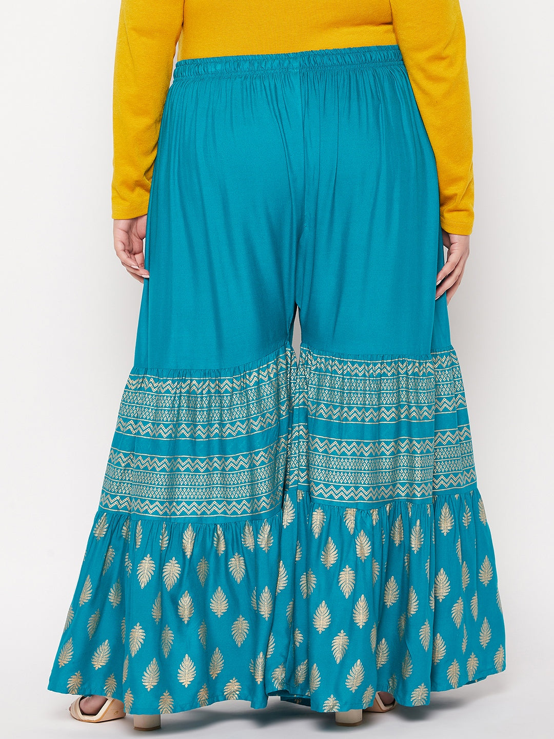 Rama Green Printed Rayon Flared Gharara with elastic waistband and drawstring.