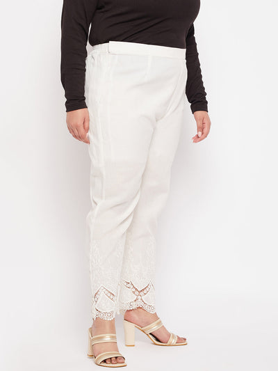 Off-White solid cotton embroidered pant, ankle length with partially elasticated waistband.