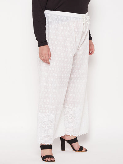 White full chikan cotton palazzo with embroidered wide leg design.