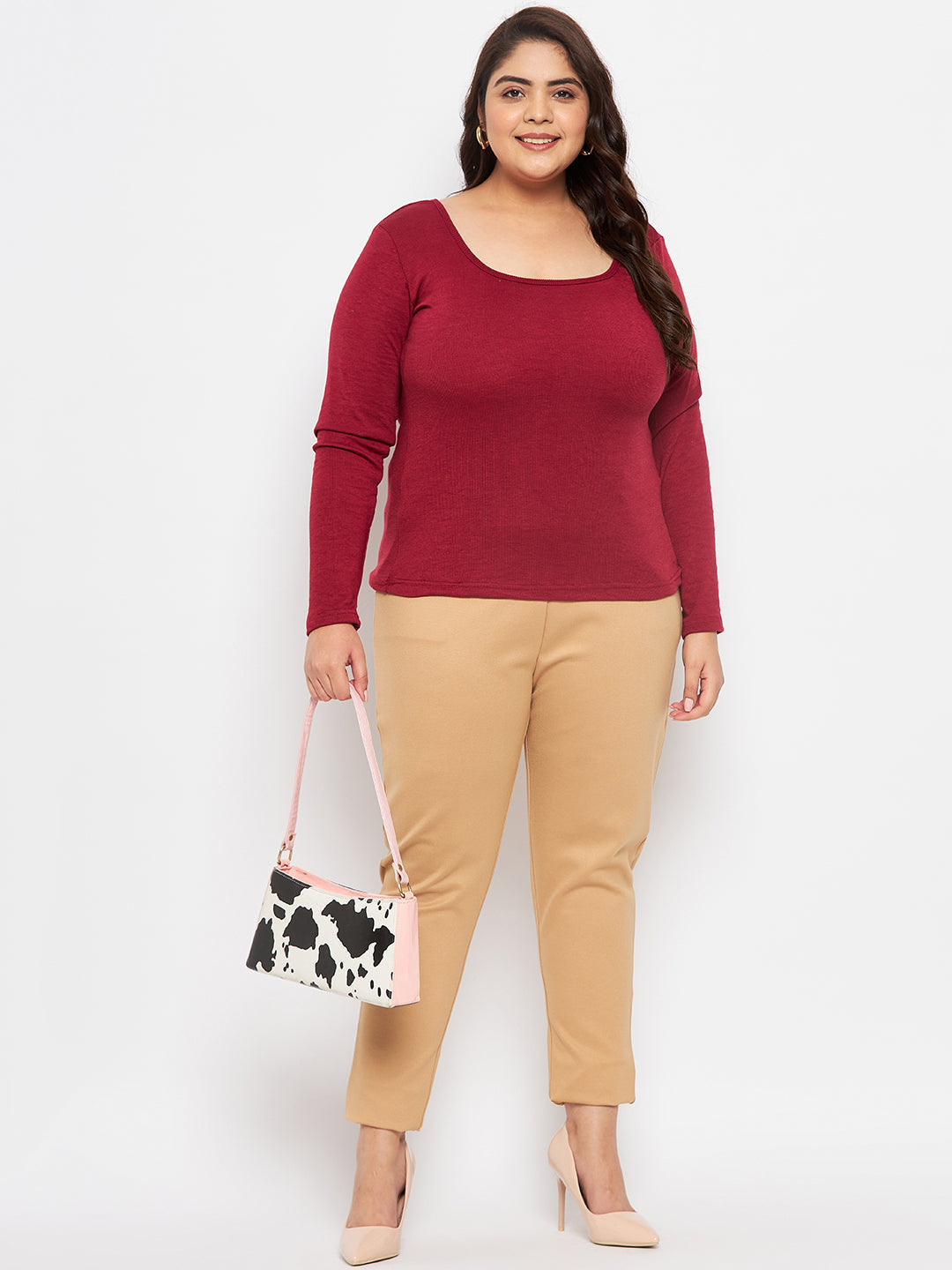 Maroon solid full sleeves top for women made of polyester, cotton, and elastane.