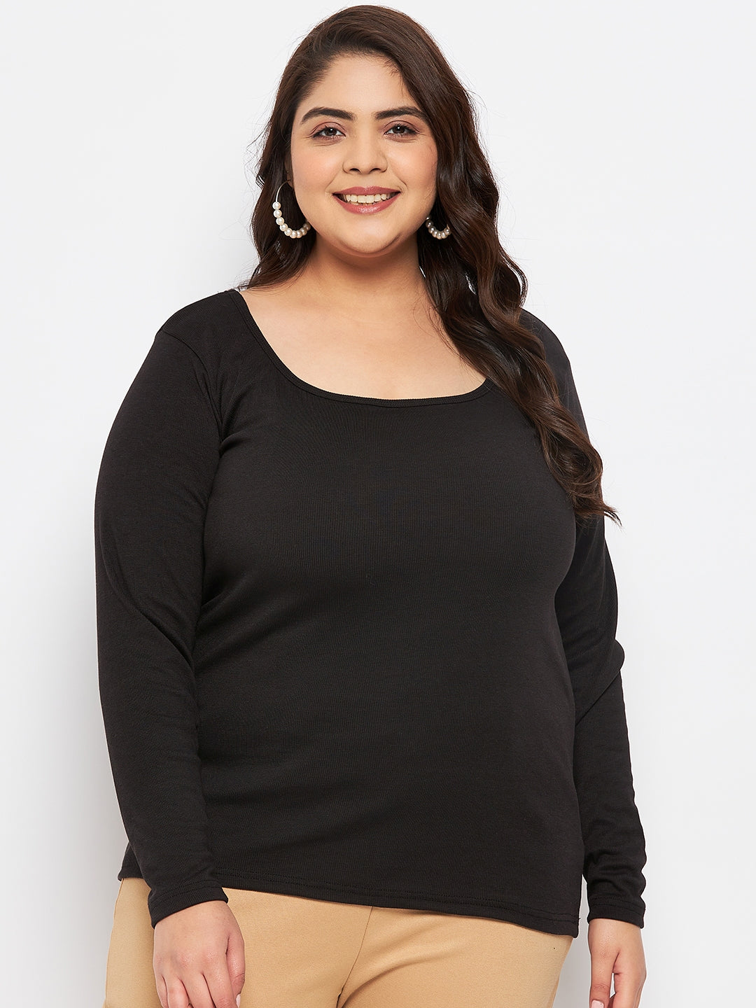 Black solid full sleeves top made of polyester, cotton, and elastane.